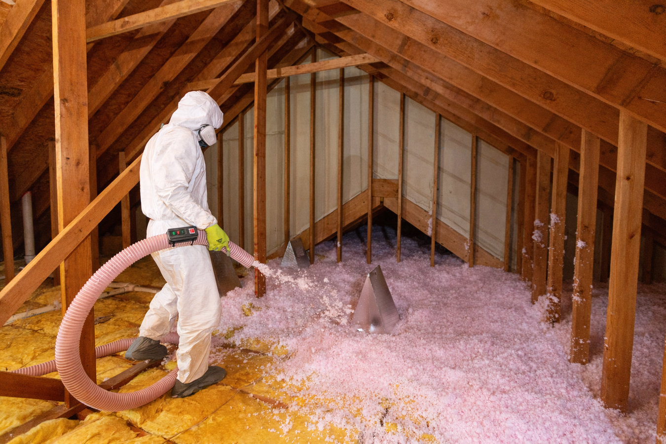 Insulation contractor working in a Victoria, TX home